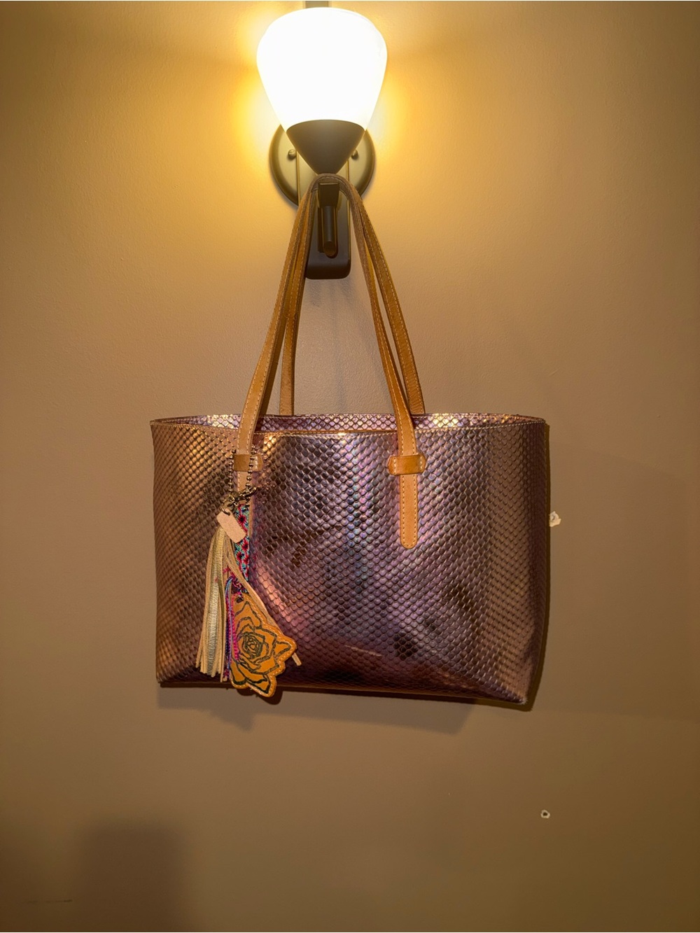Iridescent Purple Snake-Effect Tote with Tan Straps and Tassel Charm